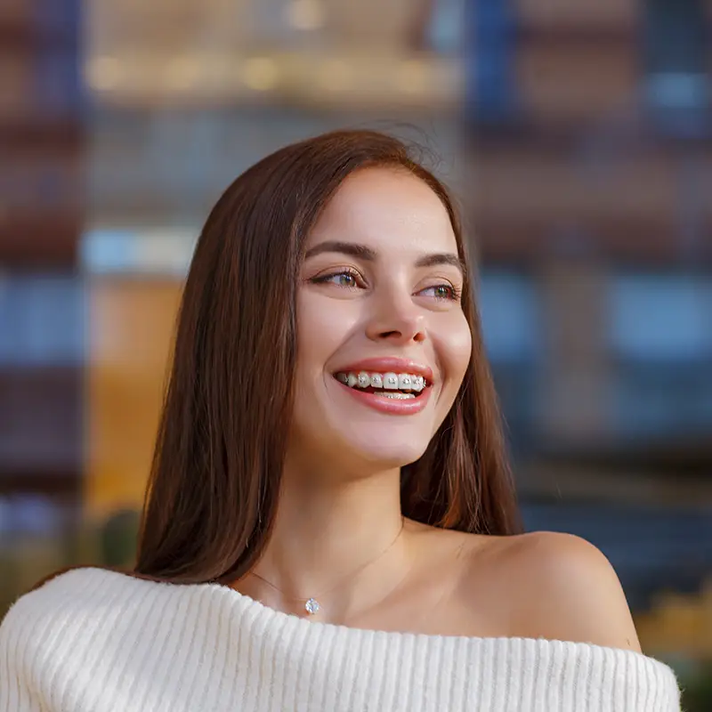 Smiling woman with braces 